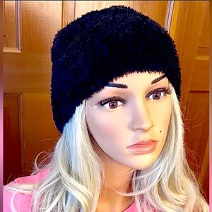 Black faux fur Cossack hat.